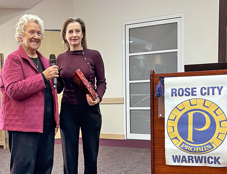 Clare Blake from QIMR being thanked by Cathy