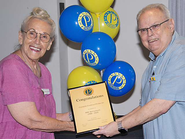 PSPL QLD REP Director Caroline presents a 30th Certificate to President Damien.