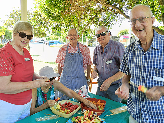 Creating the Fruit Salad skewers