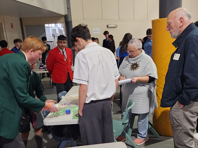 Angela Philby from Logan Village Probus Club and Col Sutcliffe from Victoria Point Probus Club supervising an activity.